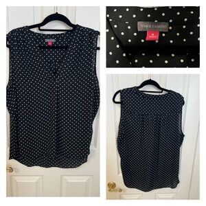 Vince Camuto black V next summer sleeveless to with white polka dots.
